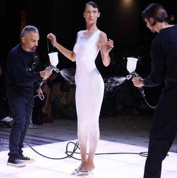 bella hadid being spray painted at coperni spring 2023